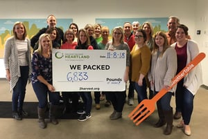 VITAL WorkLife Group post volunteering with sign 1