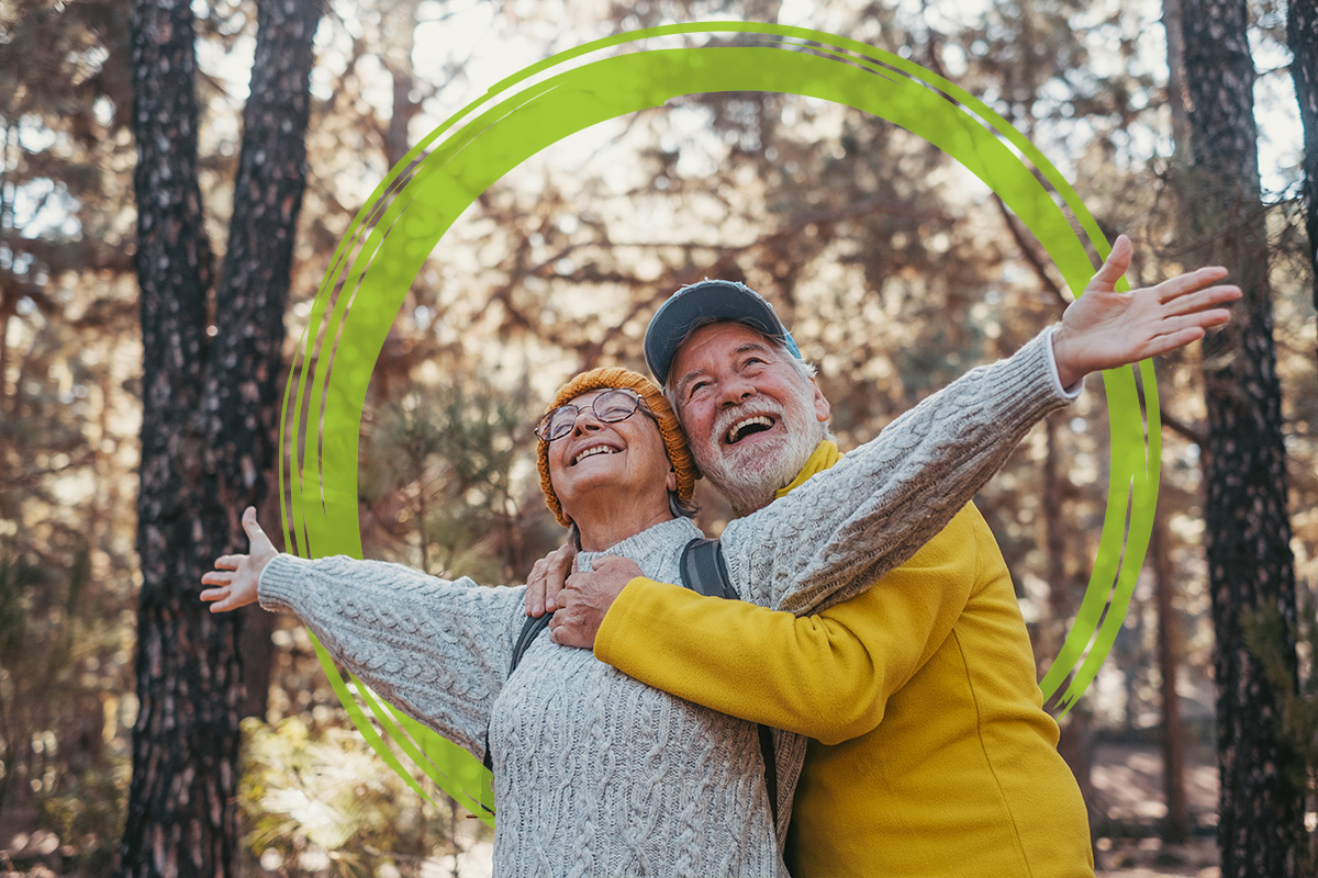 Happy older couple in nature